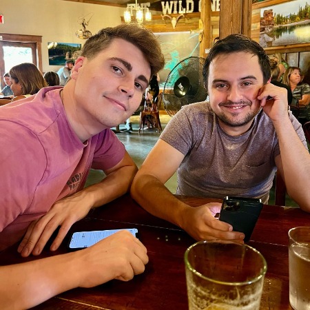 Connor Hutcherson with his love partner, Andrew Peddie.